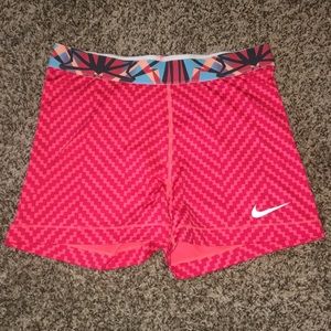 Coral print Nike spandex shorts